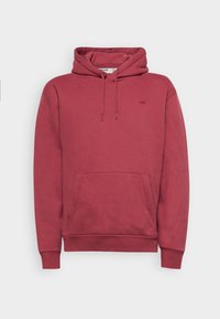 Sudadera color marrón de tela suave, con un bolsillo frontal, capucha ajustable mediante cordón y puños acanalados. Pequeño logo en el pecho.