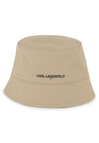 Chapeau seau beige en toile, avec un bord cousu et le logo "KARL LAGERFELD KIDS" en noir sur la bande avant.