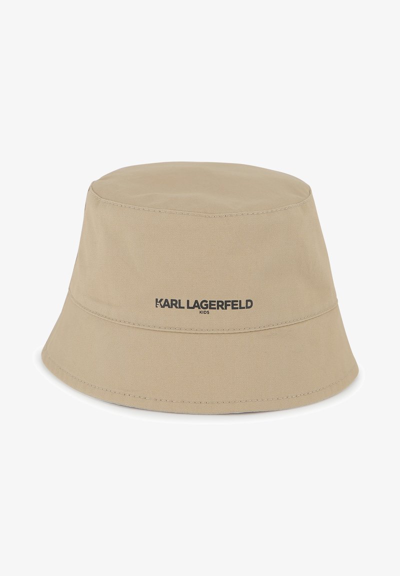 Chapeau seau beige en toile, avec un bord cousu et le logo "KARL LAGERFELD KIDS" en noir sur la bande avant.