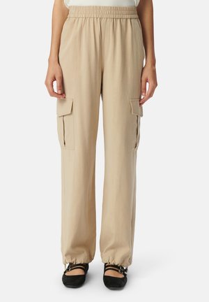 Beige cargobroek met een elastische tailleband, zijzakken en strakke enkels. Lichtgewicht stof met een soepele textuur.