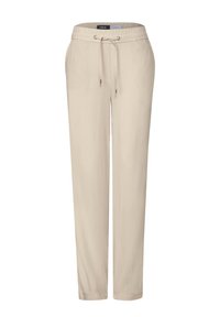 Beige tapered pants made from a lightweight fabric. Features an elastic waistband with a drawstring and side pockets. Smooth texture.