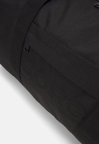 Björn Borg EMBOSSED SPORTS BAG UNISEX - Treningsbag - black beauty