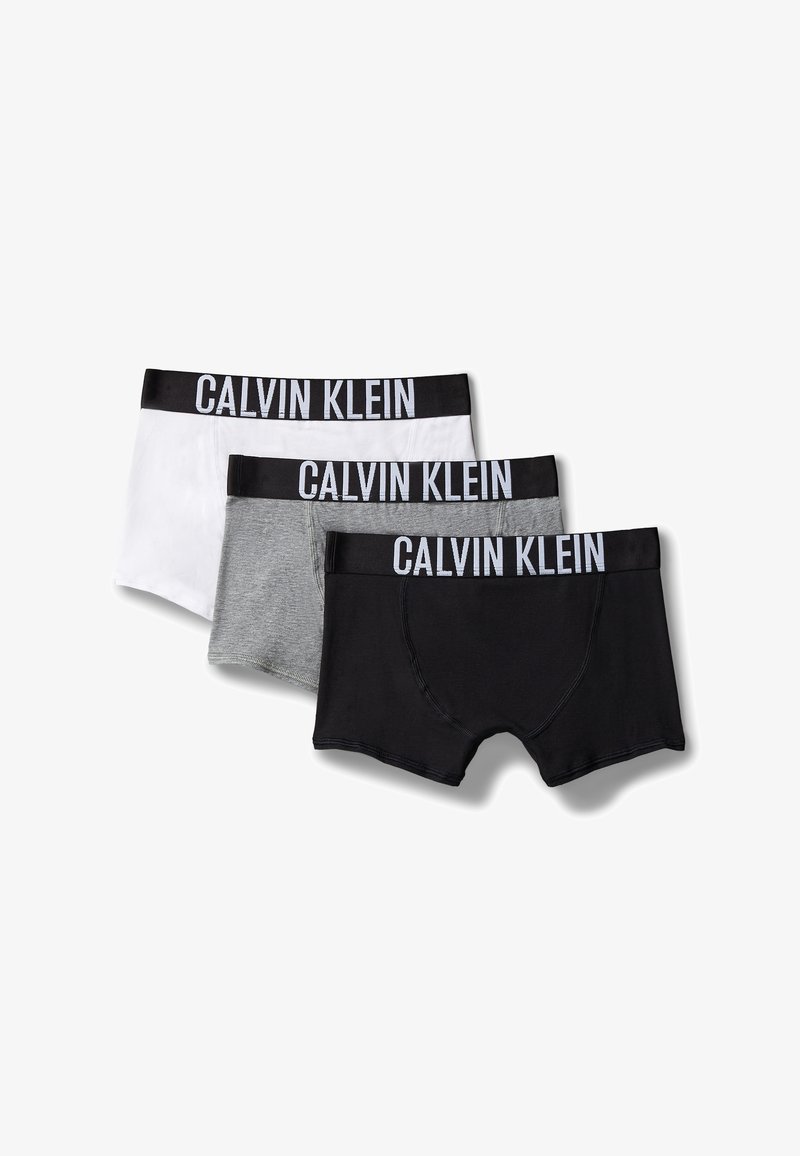 Tre boxer da uomo in nero, grigio e bianco con bande in vita nere caratterizzate dal logo bianco Calvin Klein.