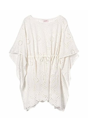 Camicia bianca in pizzo sangallo con coulisse in vita, ampie maniche a svolazzo e orlo smerlato per un look arioso e femminile.