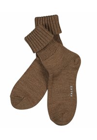 Brown cotton socks with ribbed cuffs, featuring a reinforced toe and heel. "FALKE" logo printed on the sole. Soft texture, classic design.