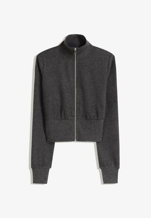 Gekürzte, dunkelgraue Zip-Jacke aus weichem Stoff mit hohem Kragen und gerippten Bündchen, ausgestattet mit einem Metallreißverschluss und ohne Taschen.