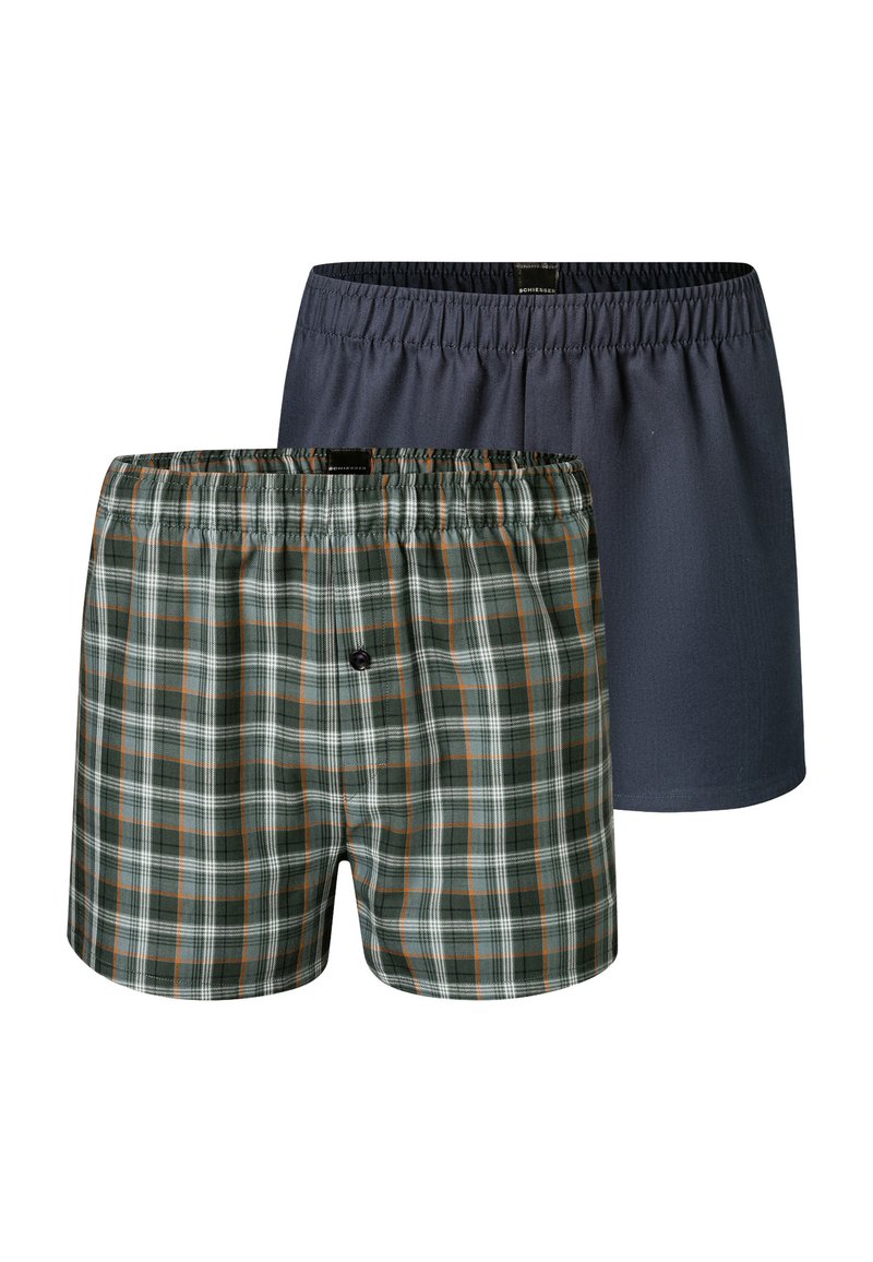 Set van boxershorts met een effen donkergrijze broek en een groen geruit broek met witte en oranje accenten. Elastische tailleband bij beide.