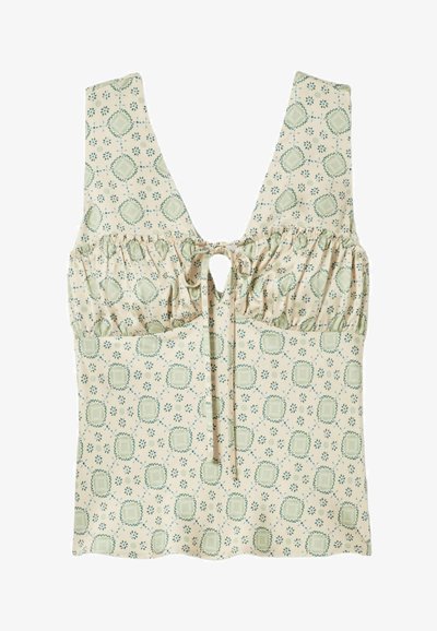 Top beige senza maniche con busto arricciato, chiusura anteriore con laccio e stampa floreale e geometrica verde.