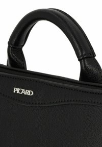 Borsa in pelle nera con design strutturato, dotata di manico rotondo e logo argentato "PICARD". Superficie testurizzata e dettagli di cucitura sottili.