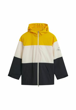 Veste colorée en blocs jaune, blanche et marine avec une capuche, fermeture éclair à l'avant, deux poches latérales et un détail graphique "Nautical" sur la manche.