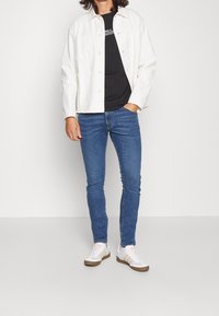 Wrangler Skinny džíny - blue denim