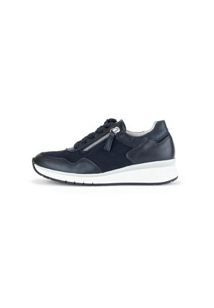 Navy blue sneaker featuring a mix of leather and suede, a round toe, white rubber sole, and side zipper closure for easy access.