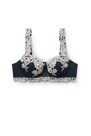 Sujeción de encaje azul marino con bordado floral crema, soporte con aros, bordes festoneados y tirantes ajustables para un ajuste seguro.