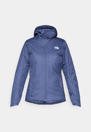 Giacca leggera blu navy con cappuccio, zip frontale e logo sul petto sinistro. Realizzata in materiale liscia e resistente all'acqua.