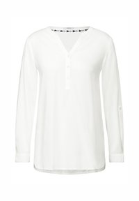 Witte blouse met lange mouwen en V-hals, knoopsluiting aan de voorkant en een contrasterend driehoekig patroon aan de binnenkant van de kraag. Soepele textuur.