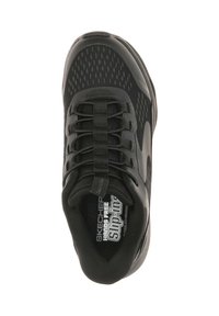 Sneaker Skechers neri slip-on con lacci elasticizzati senza nodo, sopra in rete traspirante e colletto imbottito per il comfort.