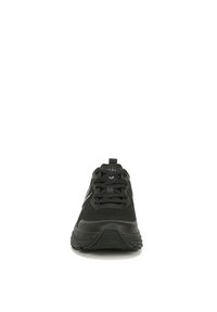 Black athletic shoe with a mesh upper, rubber sole, rounded toe, and front lacing system, featuring a textured surface and logo detail.