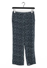 Marina byxor med blommönster, med en avslappnad passform och elastisk midja. Tillverkade av lättviktsmaterial för komfort.