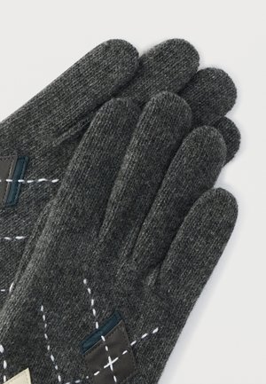 Rankning 4: AGNELLE - ZAGUILA - Fingervantar