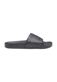Black slide sandal featuring a textured upper with embossed floral and logo patterns, flat sole, and wide strap design.
