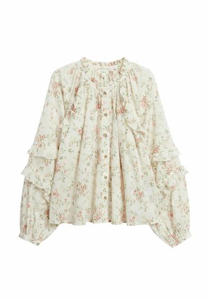 Cream blouse with pink and green floral print, front buttons, ruffled details on sleeves and neckline, and long puffed sleeves with elastic cuffs.