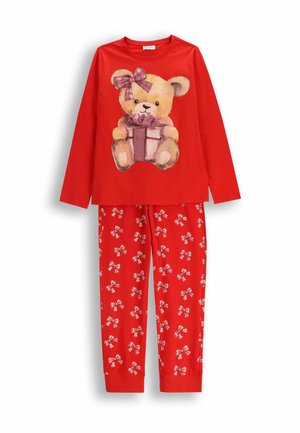 Czerwone piżamy z długim rękawem, na bluzce miś trzymający prezent, oraz czerwone spodnie w białe i różowe kokardki.