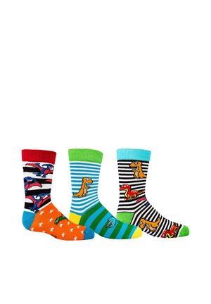 Three colorful children's socks with dinosaur patterns; one with red and blue, one with green and blue stripes, and one black and white striped.