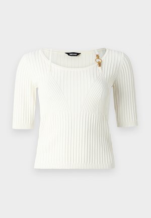 Baltā ribota blūze ar īsām piedurknēm, ar apaļu kakla izgriezumu un zeltīta metāla akcentu. Audums ir mīksts ar vertikālām svītrām.