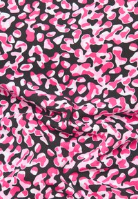 Patterned fabric featuring a black background with abstract pink and white shapes resembling a leopard print. Smooth texture.