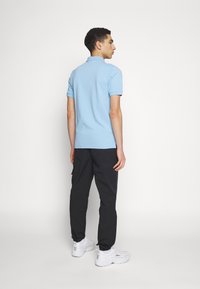 Ellesse APERIO - Cargobroek - black