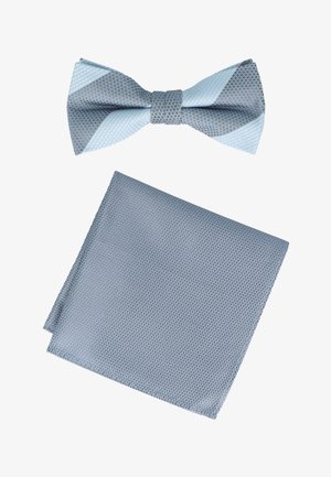 Light blue textured men's bow tie with matching pocket square, both featuring subtle diagonal patterns on a white background.