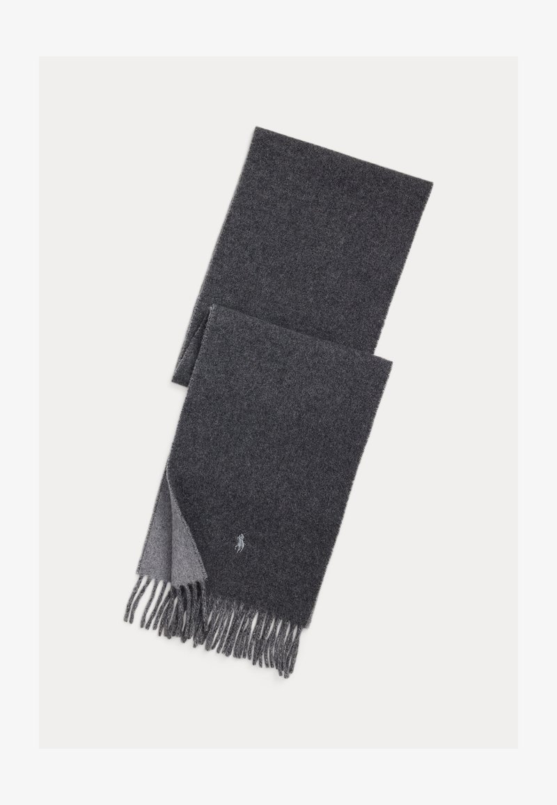 Temno siva volna rute z resami na konci, z svetlejšo sivo spodnjo stranjo in majhnim znamenjem v spodnjem kotu.