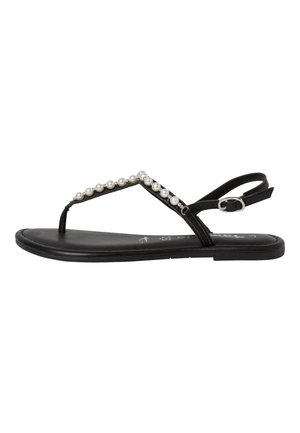 Sort flad sandal med en tårem og justerbar ankelspænde, dekoreret med en række hvide perler langs de forreste remme.