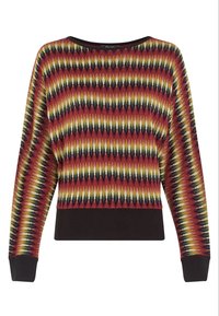Sweter w wielu kolorach z wzorem w zygzaki w odcieniach czerwieni, żółci i niebieskiego; szeroki dekolt oraz ściśnięte mankiety i dół.