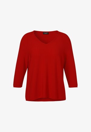 Pull tricoté rouge à col en V avec manches trois-quarts et ourlet légèrement évasé, présenté sur un fond blanc.