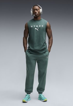 Puma, PUMA X HYROX CUTOFF TANK - Toppi - herb garden