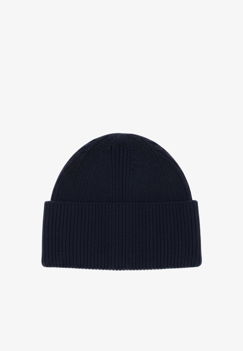 Bonnet en tricot côtelé bleu marine foncé avec revers plié, conçu pour la chaleur et un port décontracté.