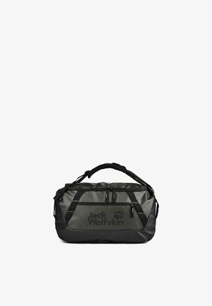 Borsa da viaggio Jack Wolfskin nera e grigio scuro con manico imbottito e più scomparti con zip su sfondo bianco.