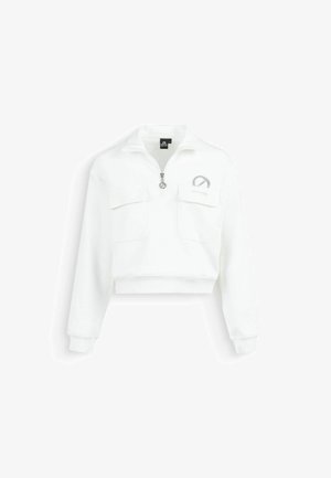 White cropped sweatshirt with long sleeves, quarter zip, two front flap pockets, and a small gray logo on the left chest.