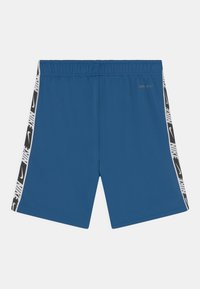 Nike Sportswear REPEAT - Teplákové kalhoty - dark marina blue/white