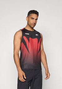 Black and red sleeveless athletic tank top featuring a gradient design with a graphic pattern and logo on the chest. Smooth texture.