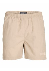 Short beige pour homme avec taille élastique et petit patch logo cousu en bas à droite de l'ourlet.