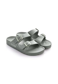 Miętowe sandały wykonane z teksturowanej gumy, z dwiema regulowanymi paskami z klamrami oraz wzorzystą wkładką dla dodatkowej przyczepności.