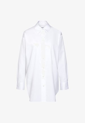 White long-sleeve button-up shirt with pointed collar and cuffs, displayed on a white background.