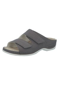 Gray suede slip-on sandal with two adjustable Velcro straps, open toe design, and a white rubber sole. Subtle stitching detail.