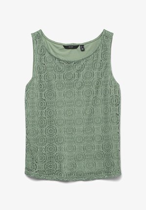 Zöld csipkés ujjatlan felső, kerek nyakkivágással. Mintázott textúrával rendelkezik, amelyen kör alakú motívumok találhatók.