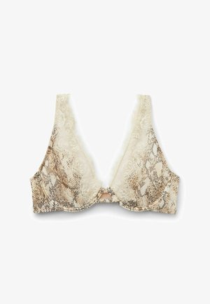 Podprsenka s krajkovým lemem, béžovým a hnědým hadím vzorem, s kosticemi a hlubokým výstřihem do V na bílém pozadí.