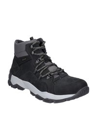 Svart vandringskänga med överdel i mocka, grå textilkrage, snörning och en vit gummisula med texturerat mönster för grepp och stöd.