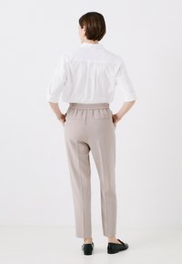 Caroll PDANNA - Trainingsbroek - beige