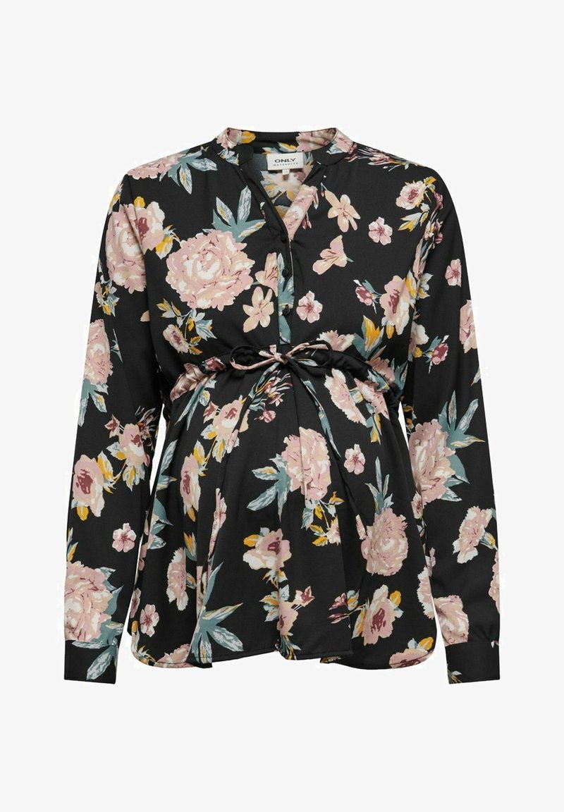Blouse de maternité noire à fleurs avec manches longues, devant à boutons et lien à la taille. Présente des fleurs roses et jaunes avec des feuilles vertes.